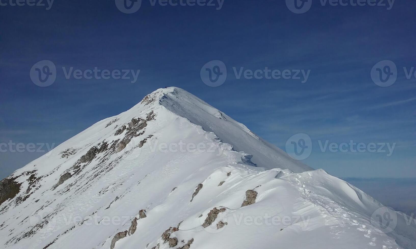 The ridge leading to the Ljuboten peak of Shar Mountain, on a sunny winter day photo