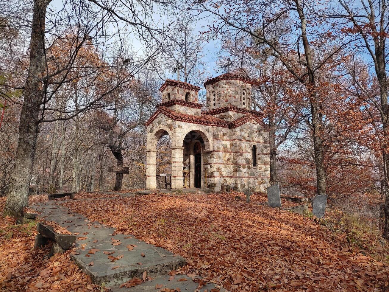 The Church of Saint Prophet Elijah in the village of Dolno Jelovce, Gostivar, Macedonia, in a beautiful autumn day photo