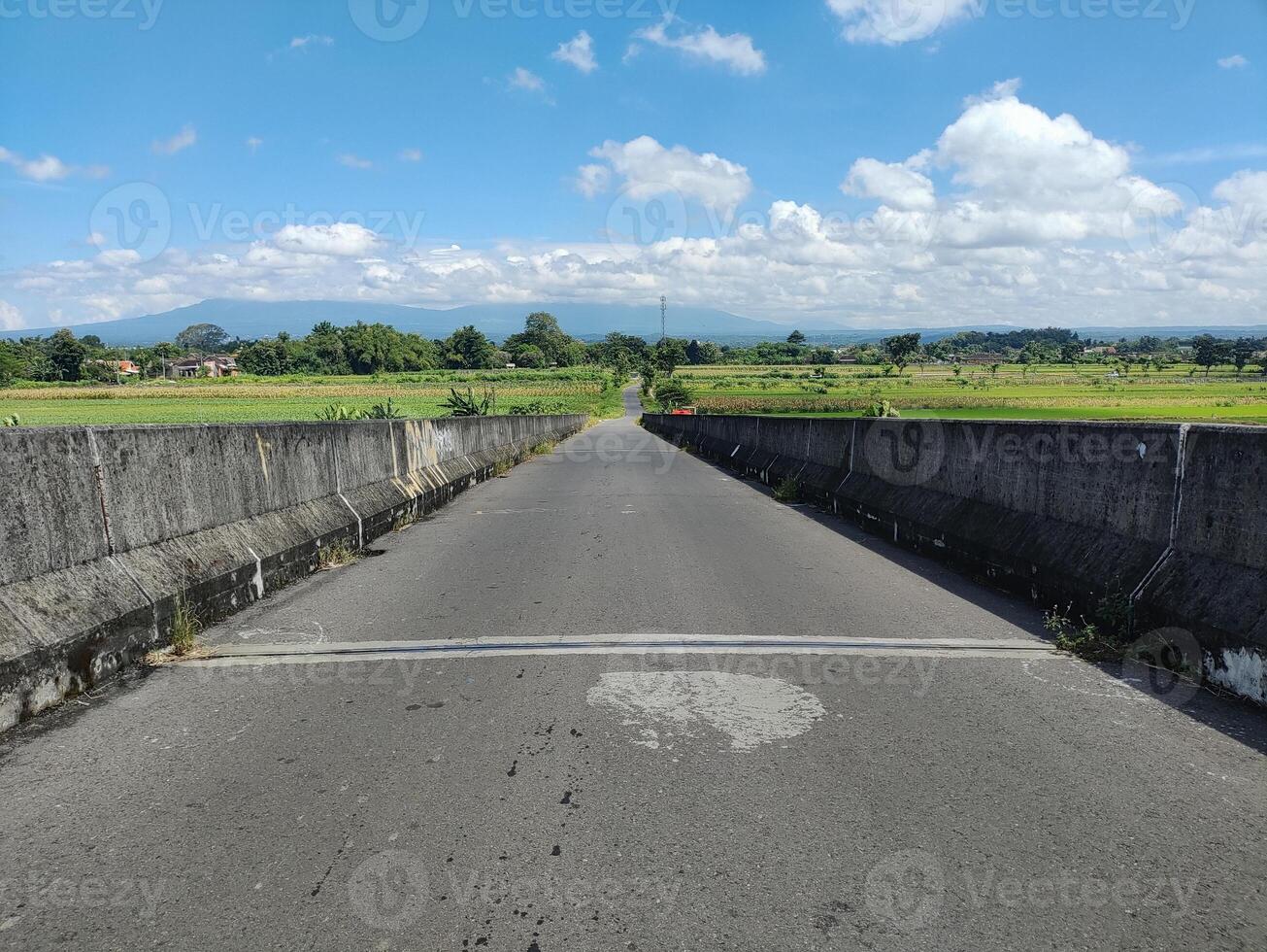 street view on flyover against blue sky photo