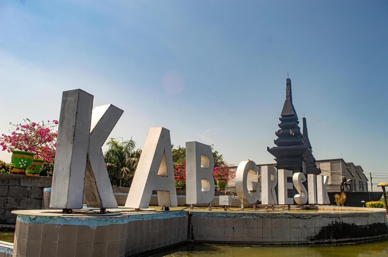 a monument and border gate between the city of Surabaya and Gresik Regency with the signature or name of Gresik Regency, Indonesia, 16 May 2024. photo