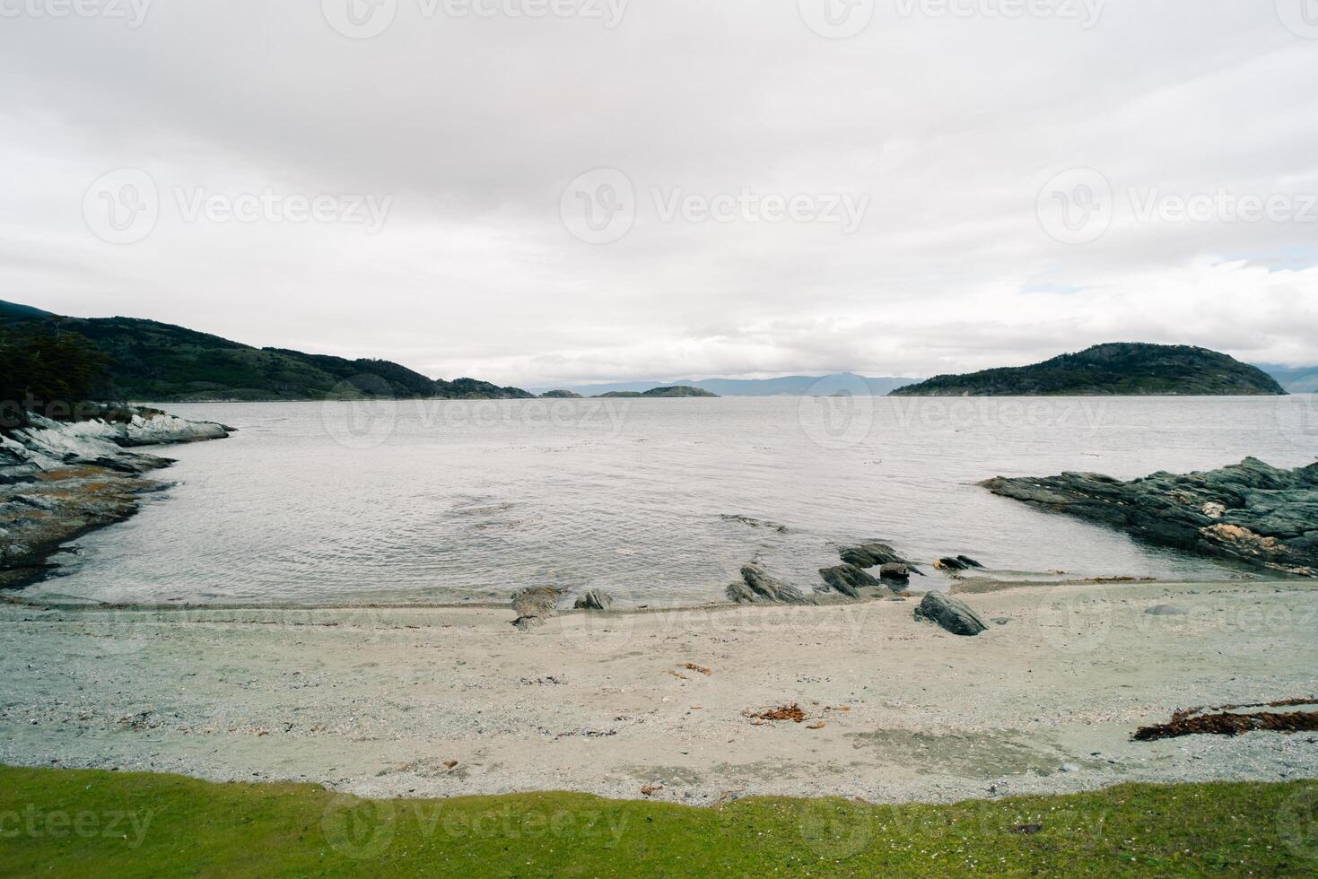 lake in Bahia Lapataia amidst mountains at Tierra del Fuego photo