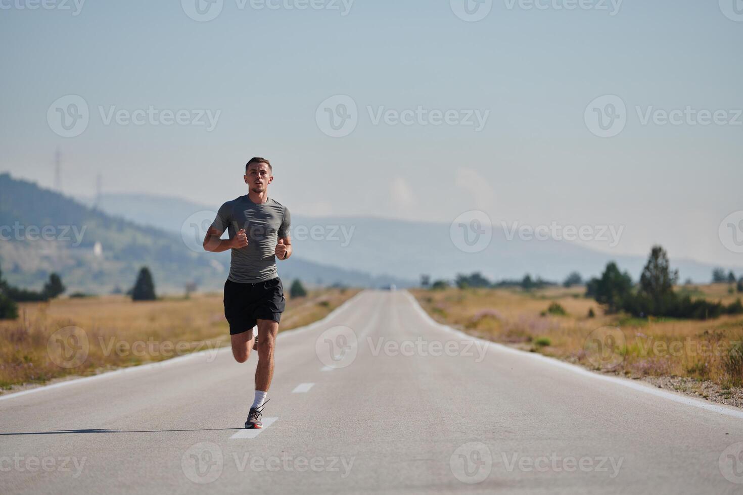 A dedicated marathon runner pushes himself to the limit in training. photo