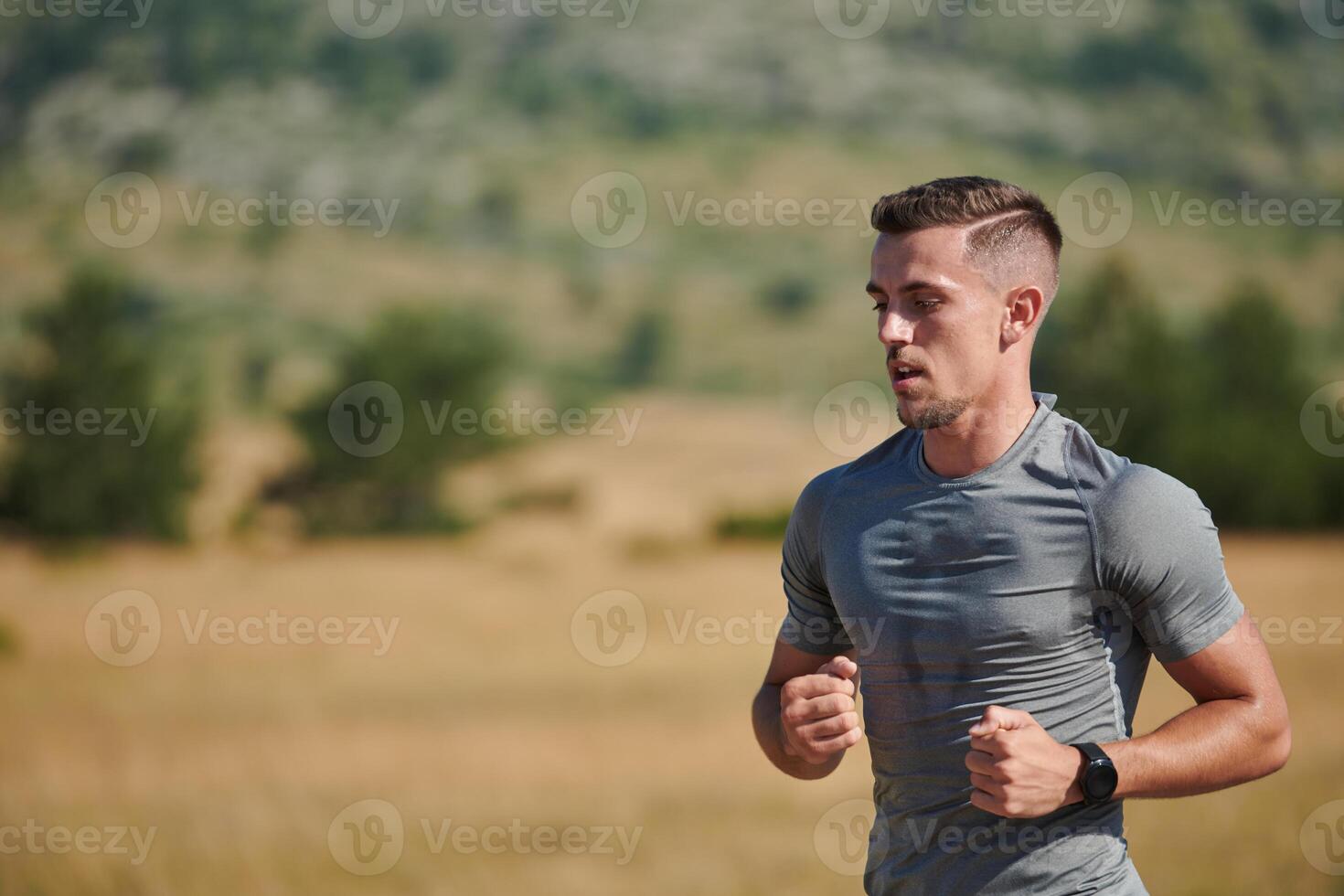 A dedicated marathon runner pushes himself to the limit in training. photo