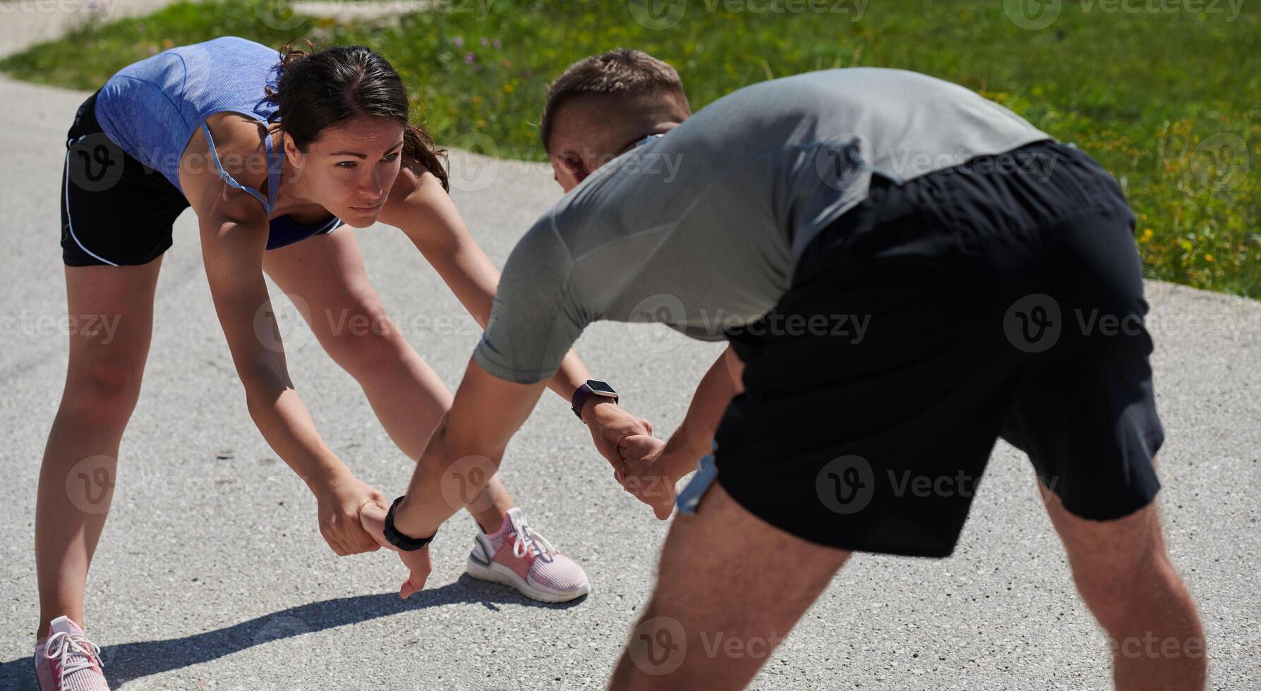 Exercise, mockup and couple workout and stretch together outdoors in nature by a mountain for health, wellness and fitness. People, partners and athletes training and keeping fit and heathy photo