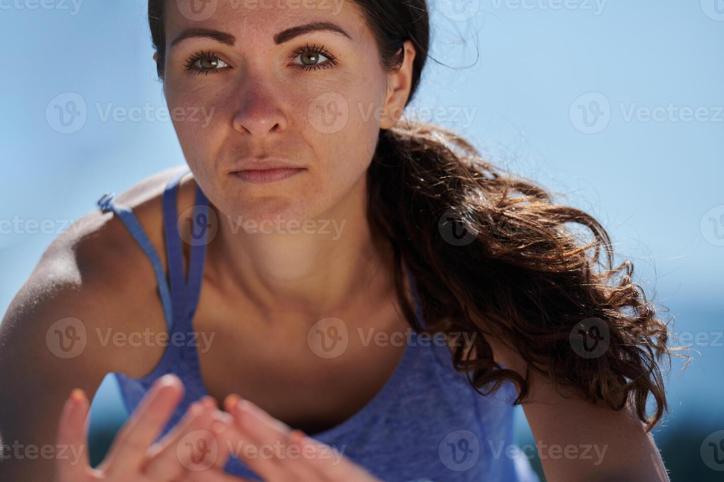 Determined Stretch. Athletic Woman Embraces Post-Run Flexibility in Nature. photo