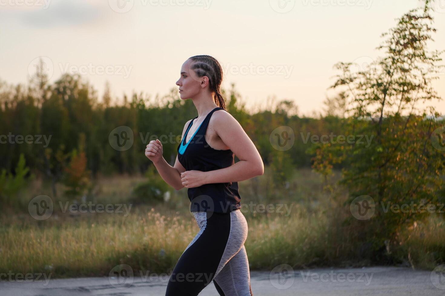 Solo Stride. Determined Athlete Woman Embarks on Fitness Journey for Marathon Preparation. photo