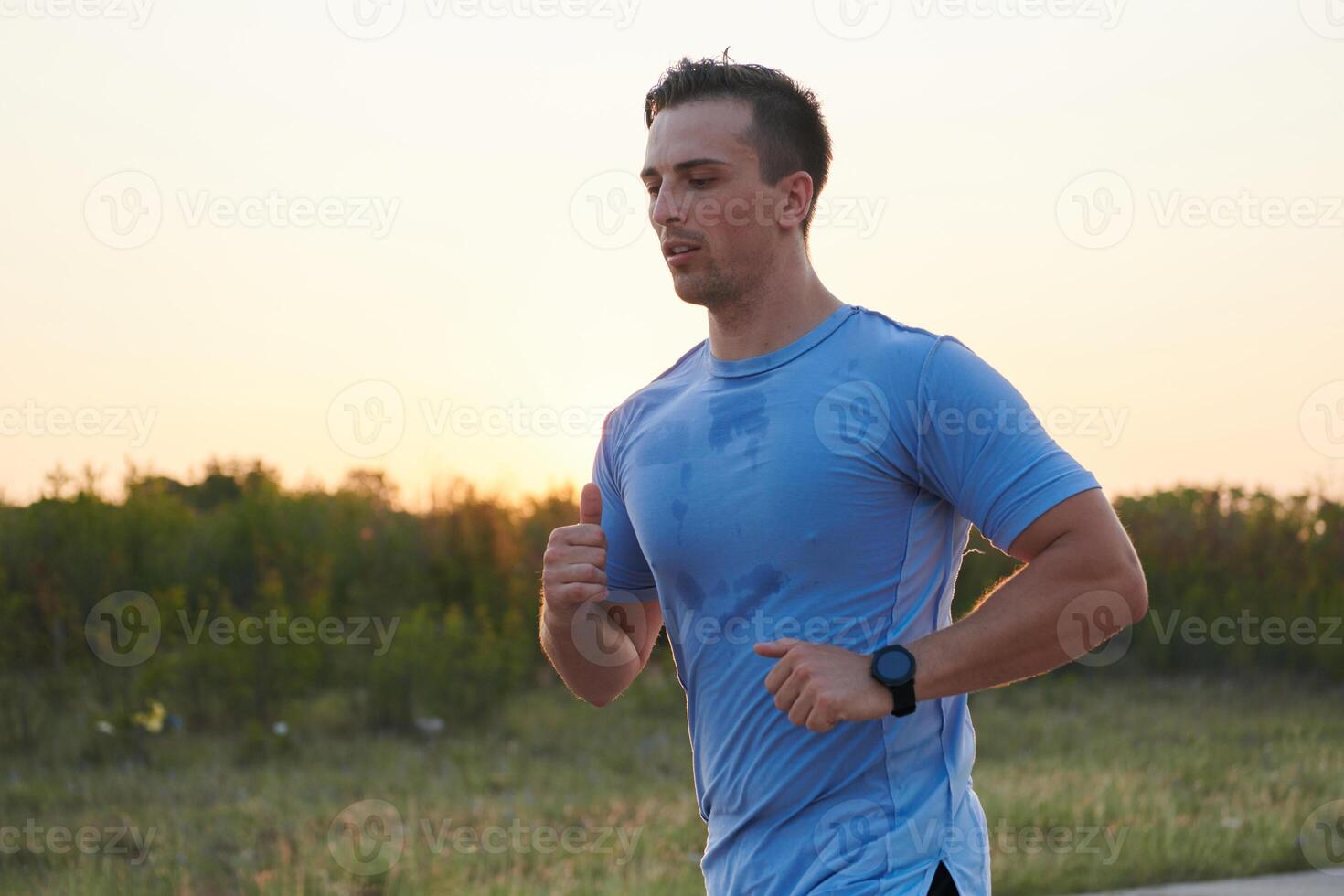 A dedicated marathon runner pushes himself to the limit in training. photo