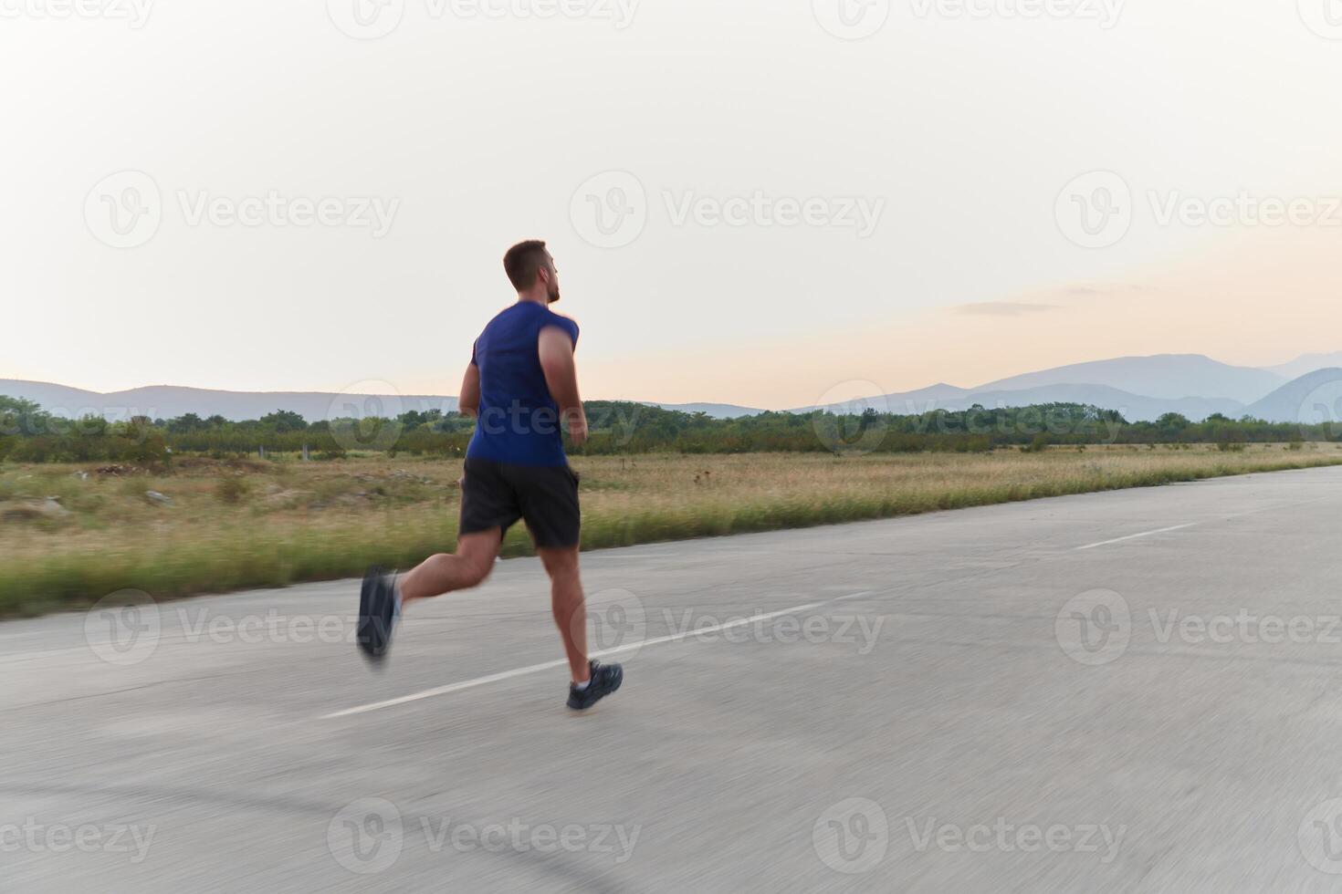 A dedicated marathon runner pushes himself to the limit in training. photo