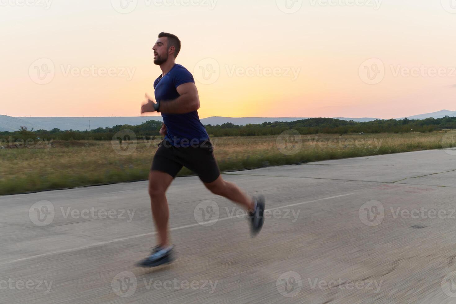 A dedicated marathon runner pushes himself to the limit in training. photo