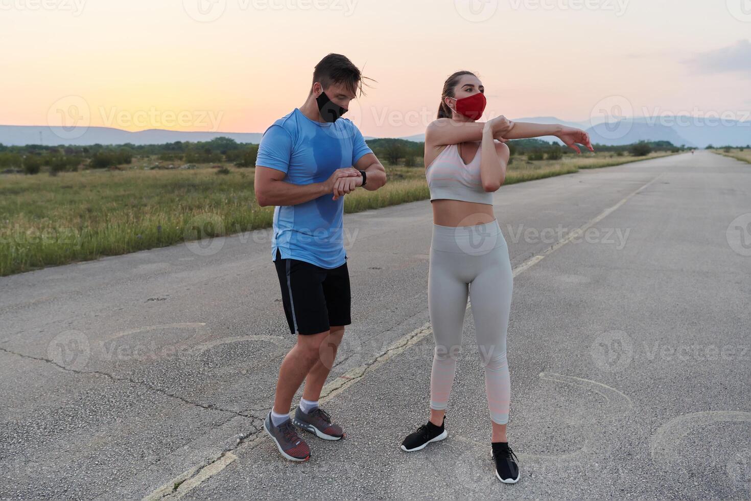 Diverse Athletic Warm-Up. Group Prepares for Intense Running Challenge. photo