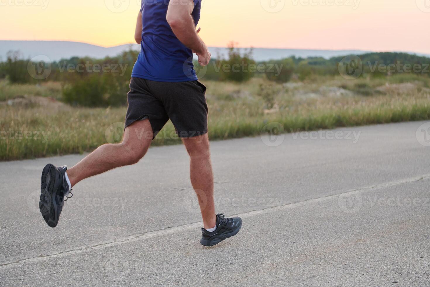 A dedicated marathon runner pushes himself to the limit in training. photo