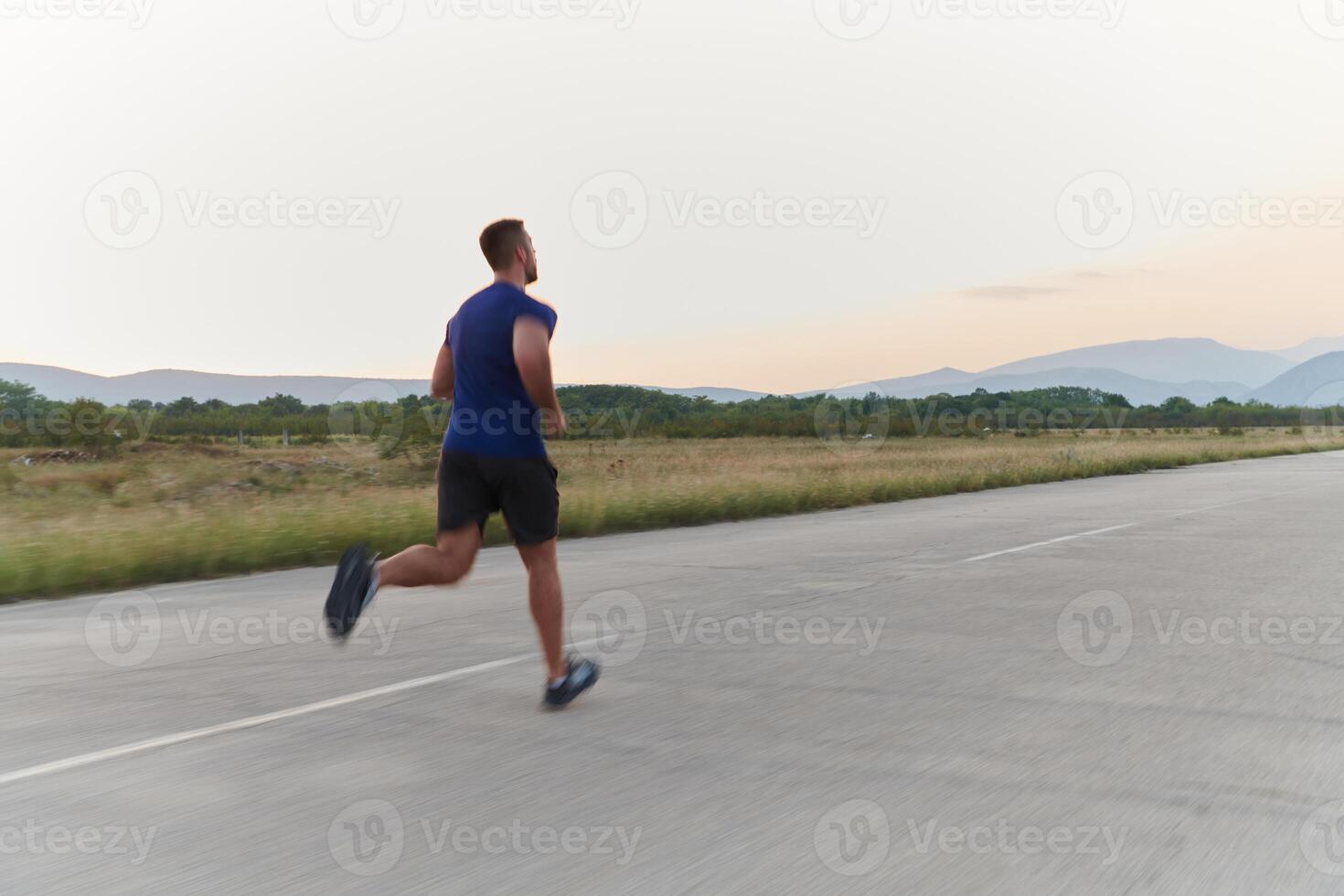 A dedicated marathon runner pushes himself to the limit in training. photo