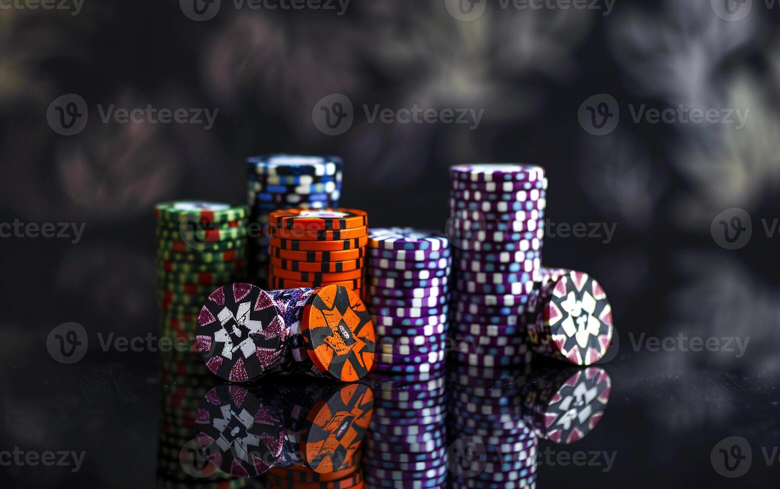 A large number of multi-colored poker chips. Big wins and excitement of the game photo
