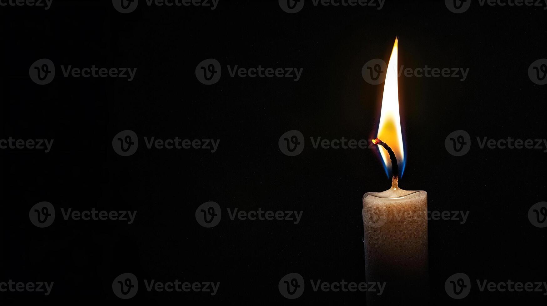 Burning white candle on black background. Close-up photo. With copy space. Image for memory of events and people photo