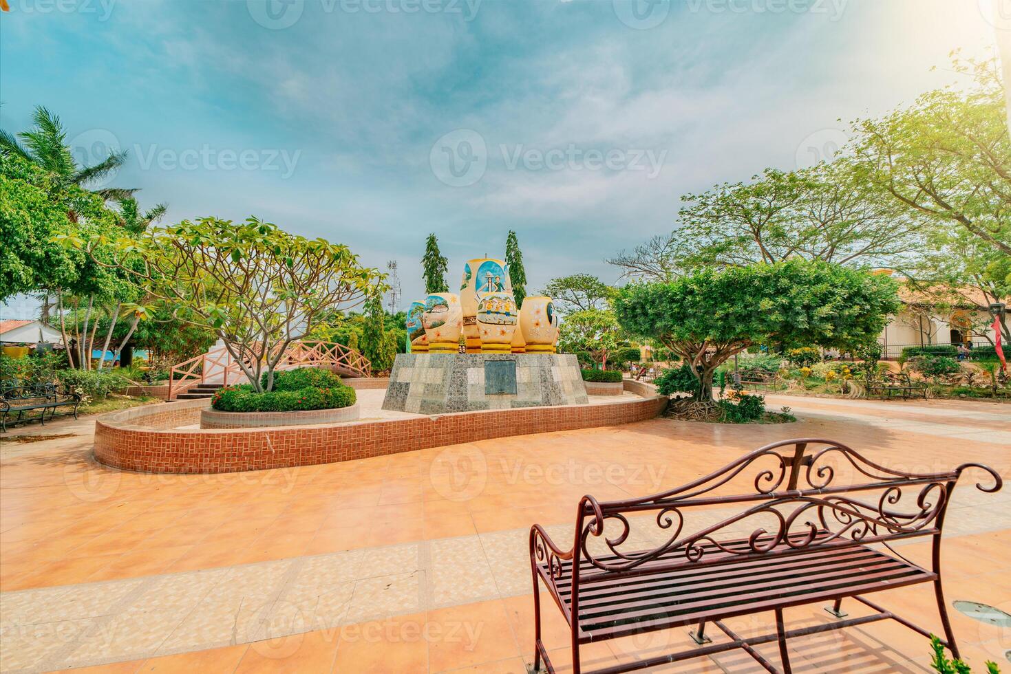 Beautiful Nagarote central park on sunny day. A beautiful natural park surrounded by trees. Traditional park of Nagarote, Nicaragua photo