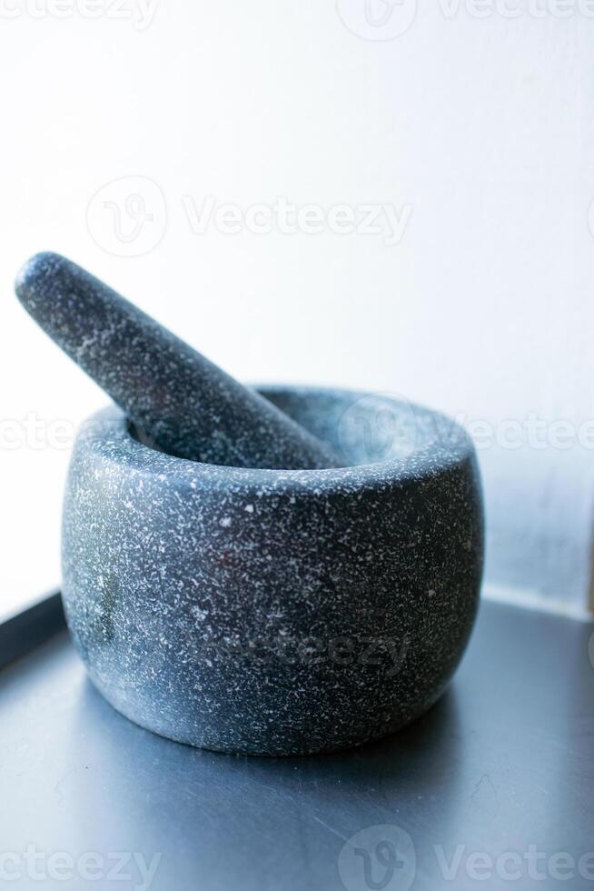 Black marble mortar and pestle photo