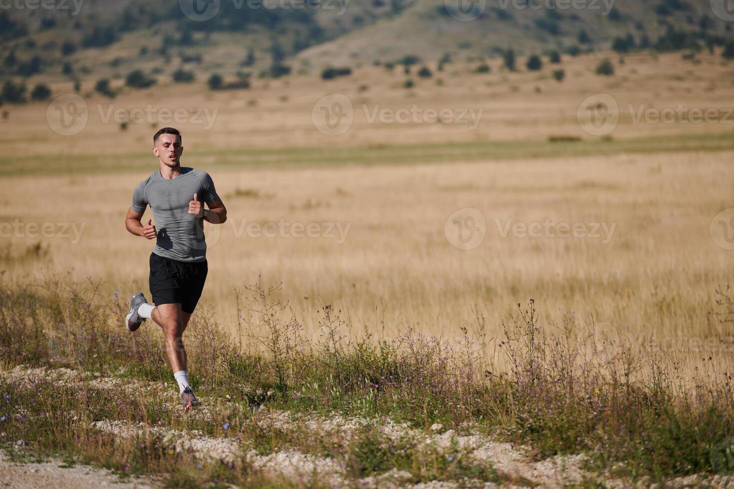 Determined Stride. Athletic Man Embarks on Marathon Preparation with Resolve. photo