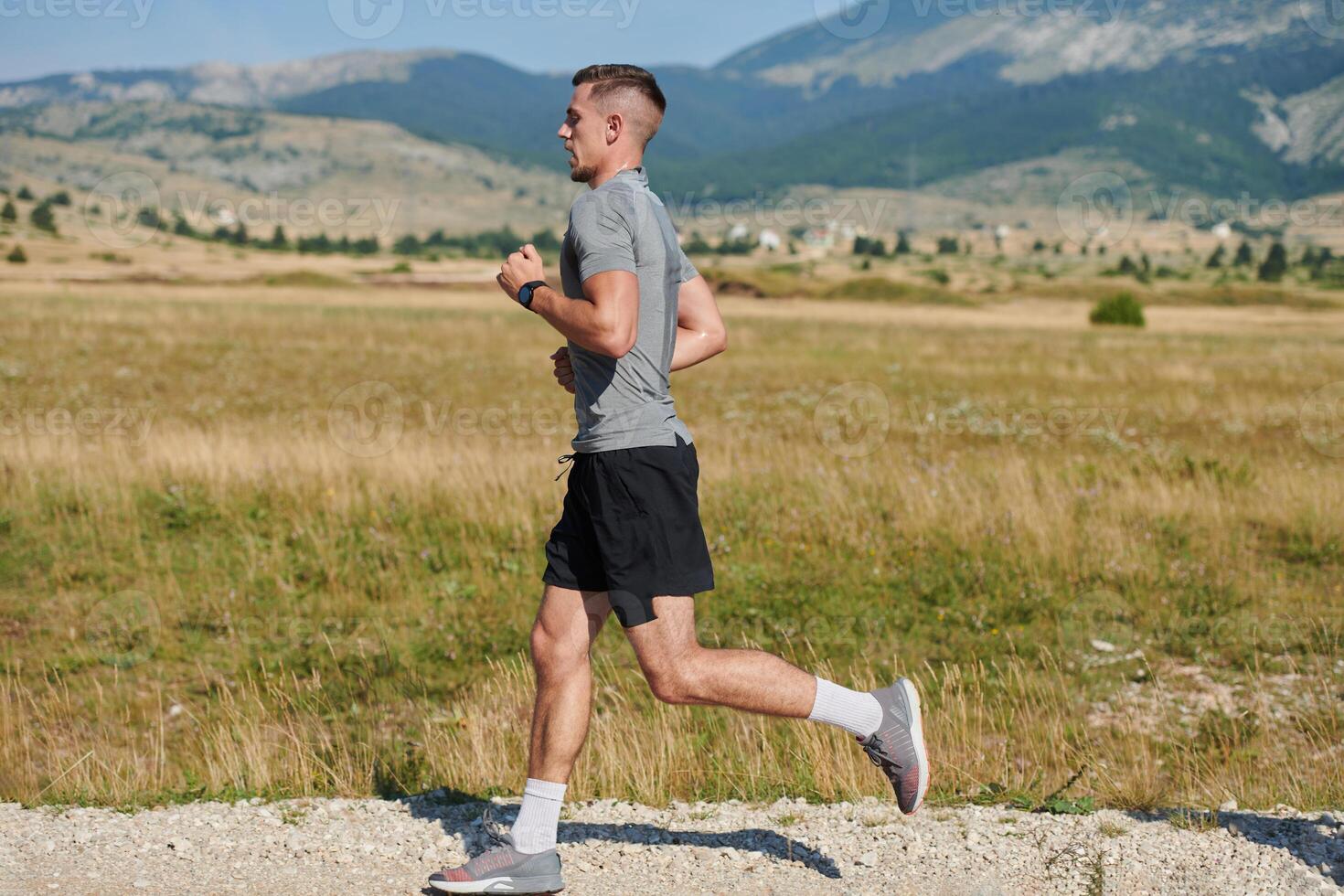 Determined Stride. Athletic Man Embarks on Marathon Preparation with Resolve. photo