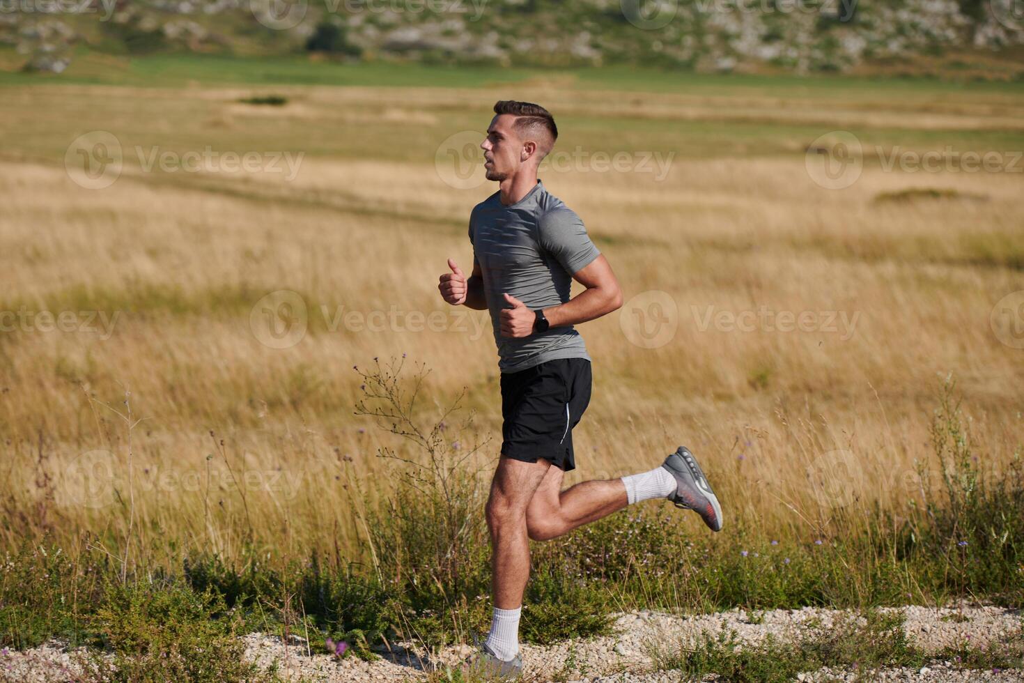 Determined Stride. Athletic Man Embarks on Marathon Preparation with Resolve. photo