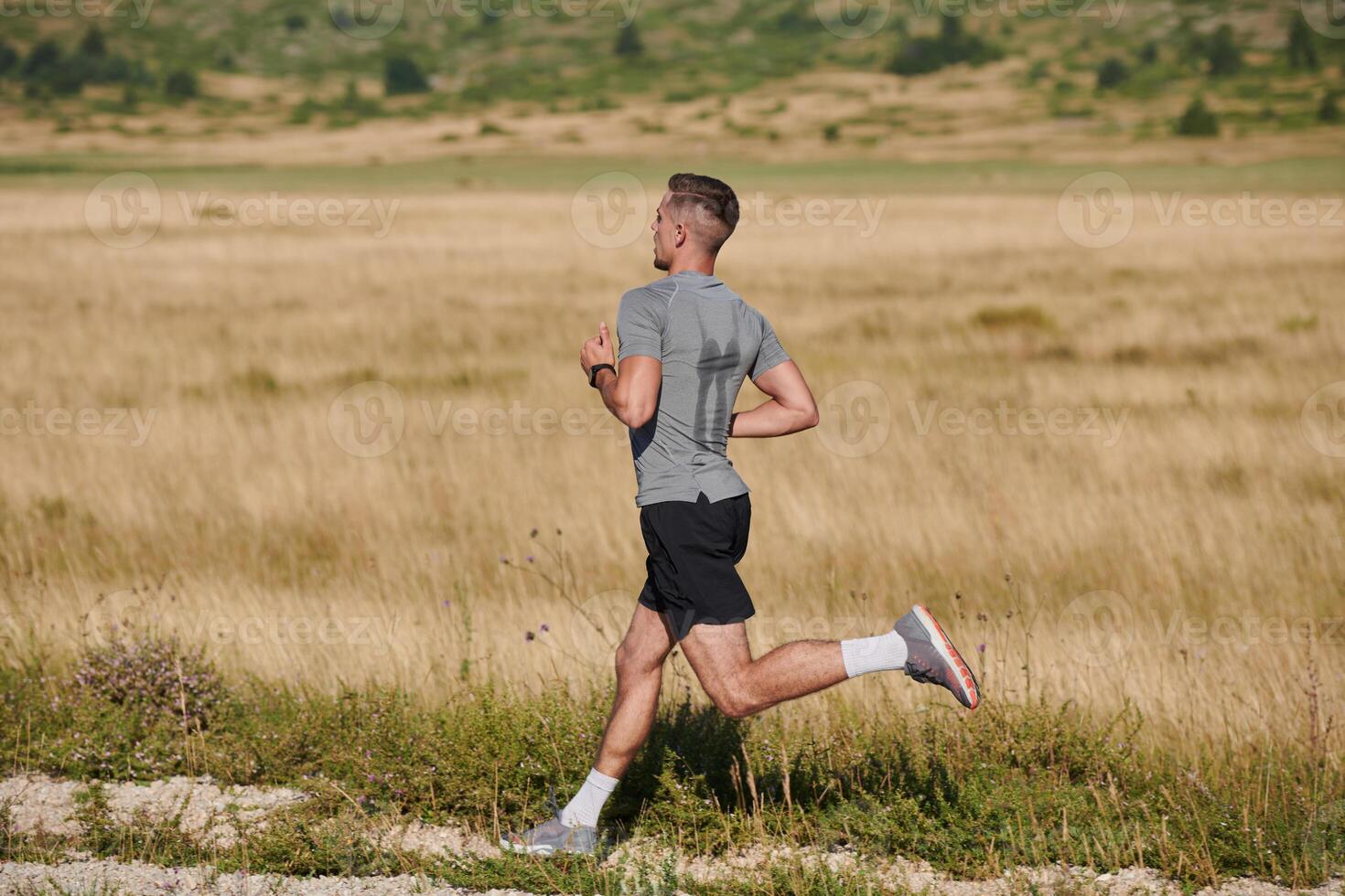 Determined Stride. Athletic Man Embarks on Marathon Preparation with Resolve. photo