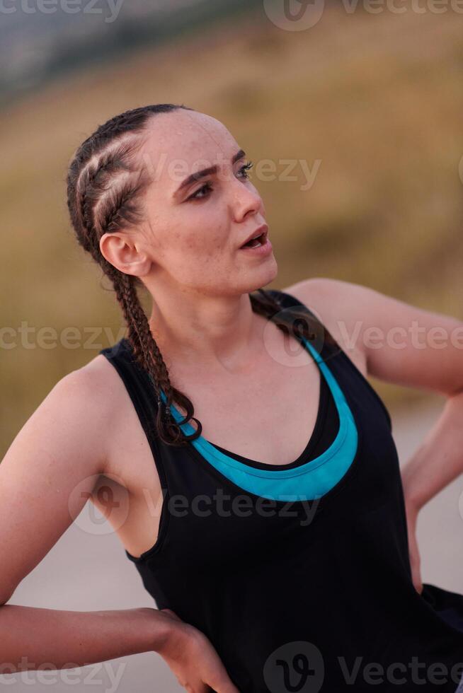 Close-Up Portrait of Determined Athlete Resting After Intense Workout photo