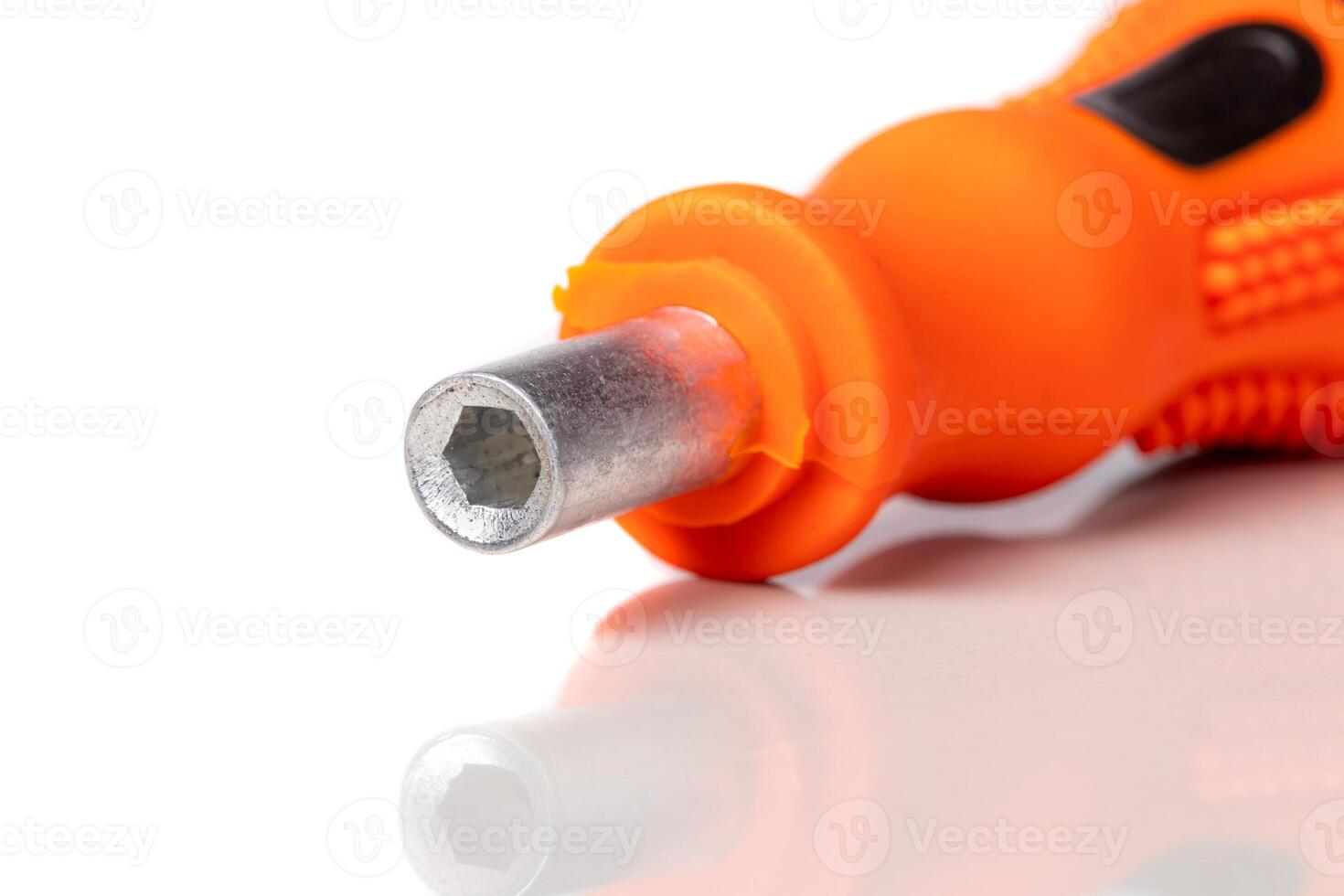 A set of different attachments for a head screwdriver with a screwdriver on a white background photo