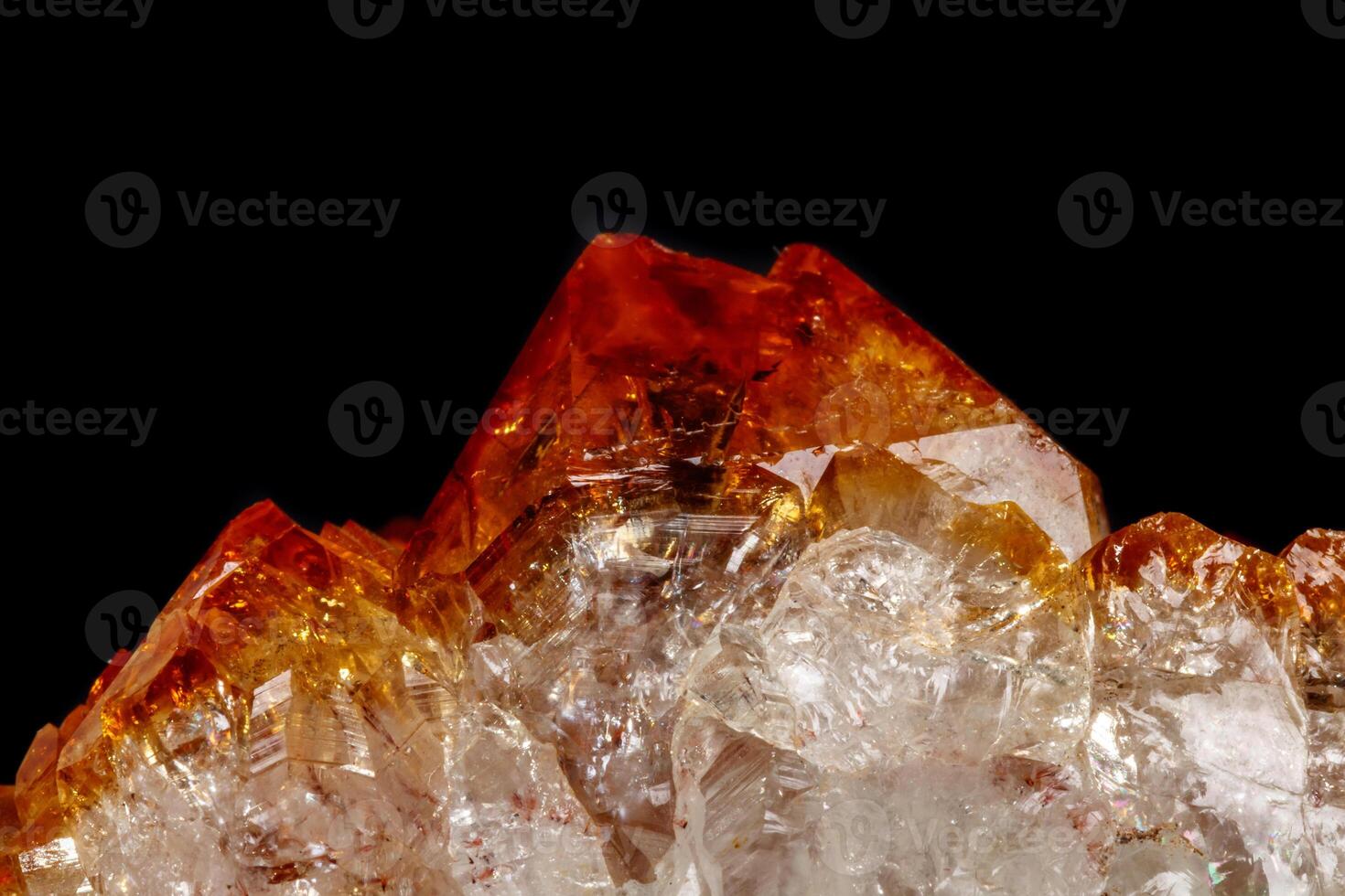 Macro mineral stone Citrine in rock in crystals on a black background photo
