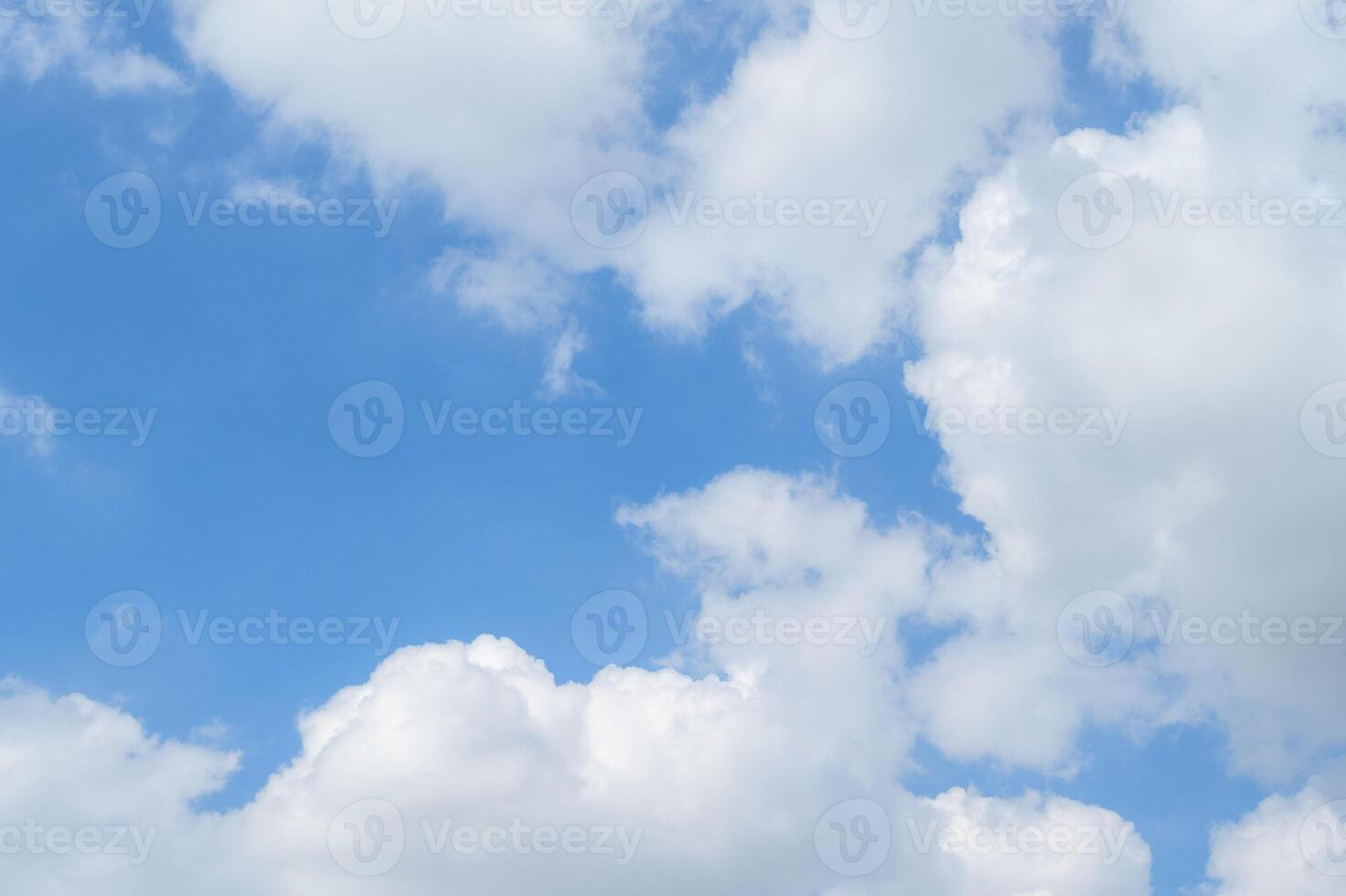 Vibrant colors dance in the sky as sunlight breaks through fluffy clouds. photo