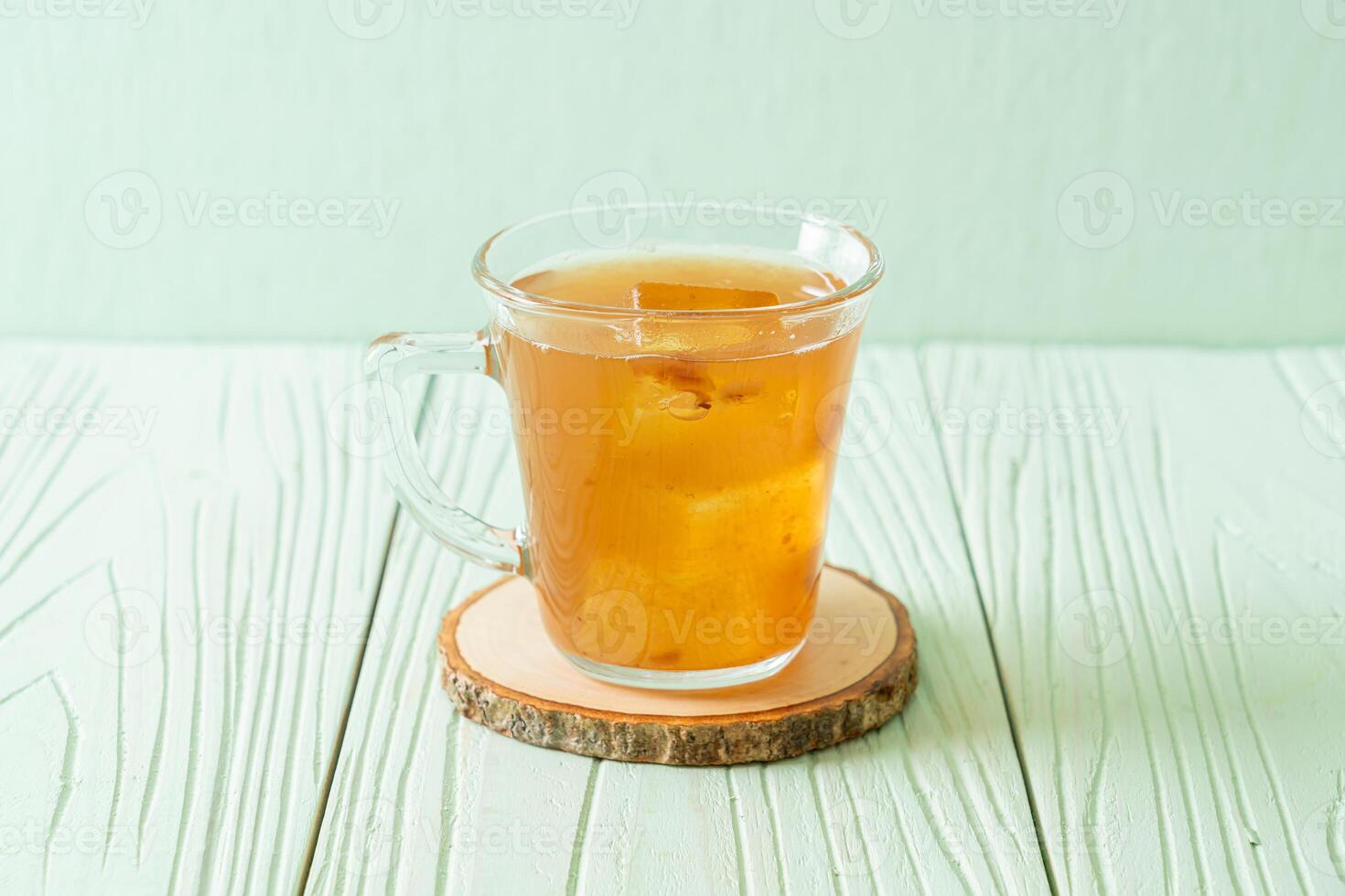 Delicious sweet drink tamarind juice and ice cube photo