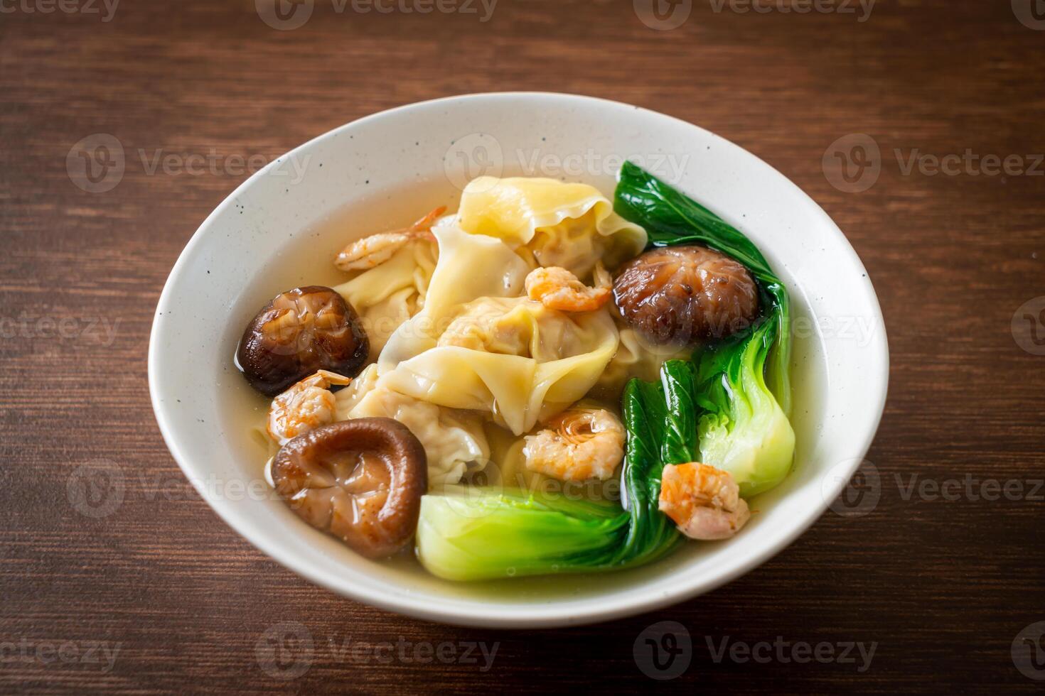 pork dumpling soup with shrimps and vegetable photo