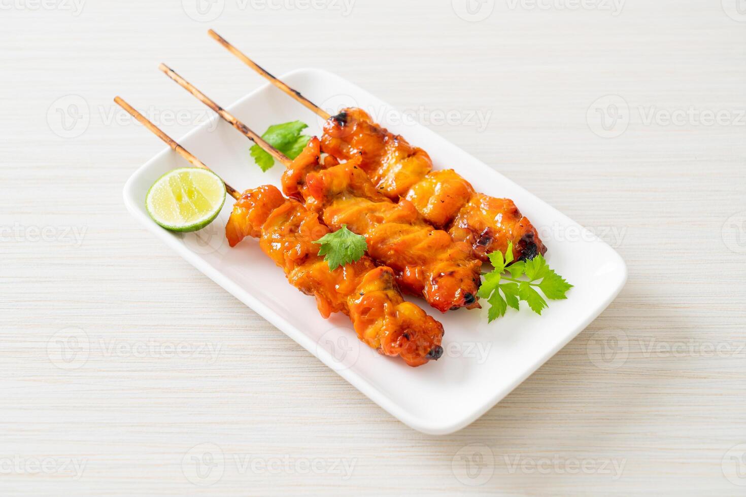 grilled chicken skewer with herbs and spices photo