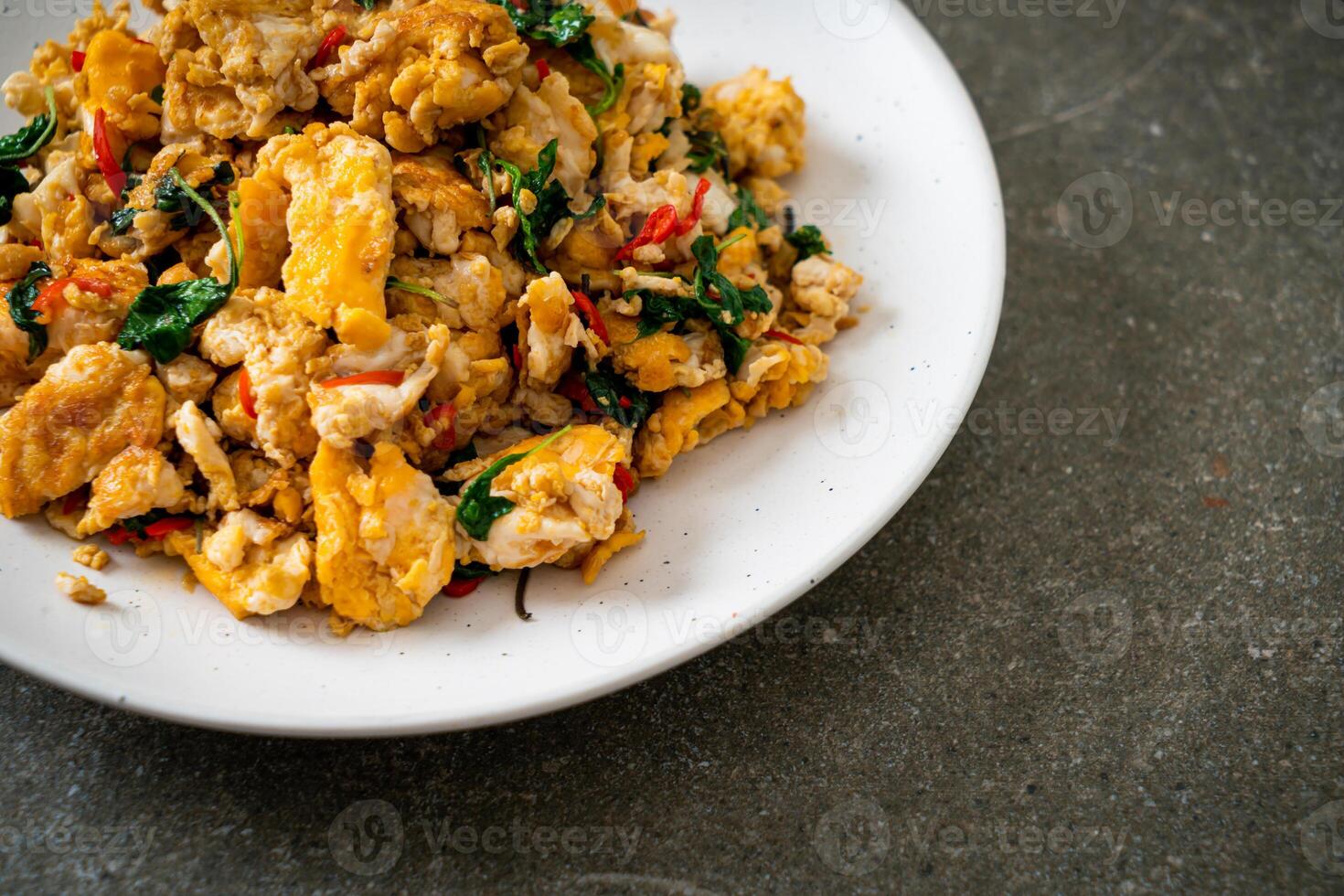 stir-fried egg with Thai basil and chilli photo