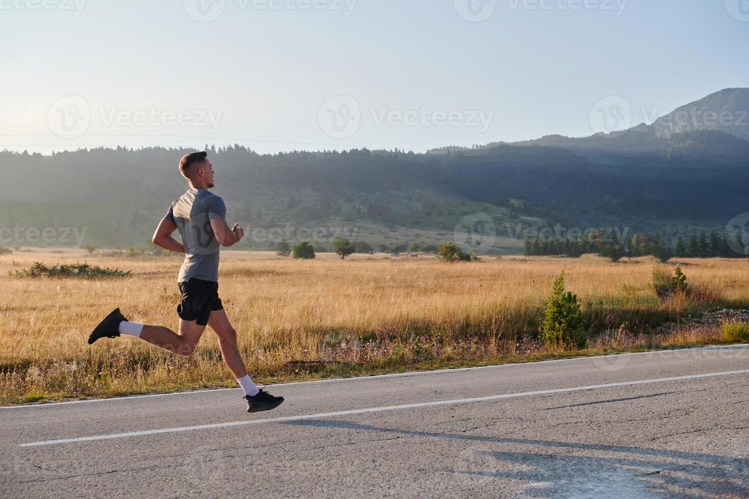 Determined Stride. Athletic Man Embarks on Marathon Preparation with Resolve. photo