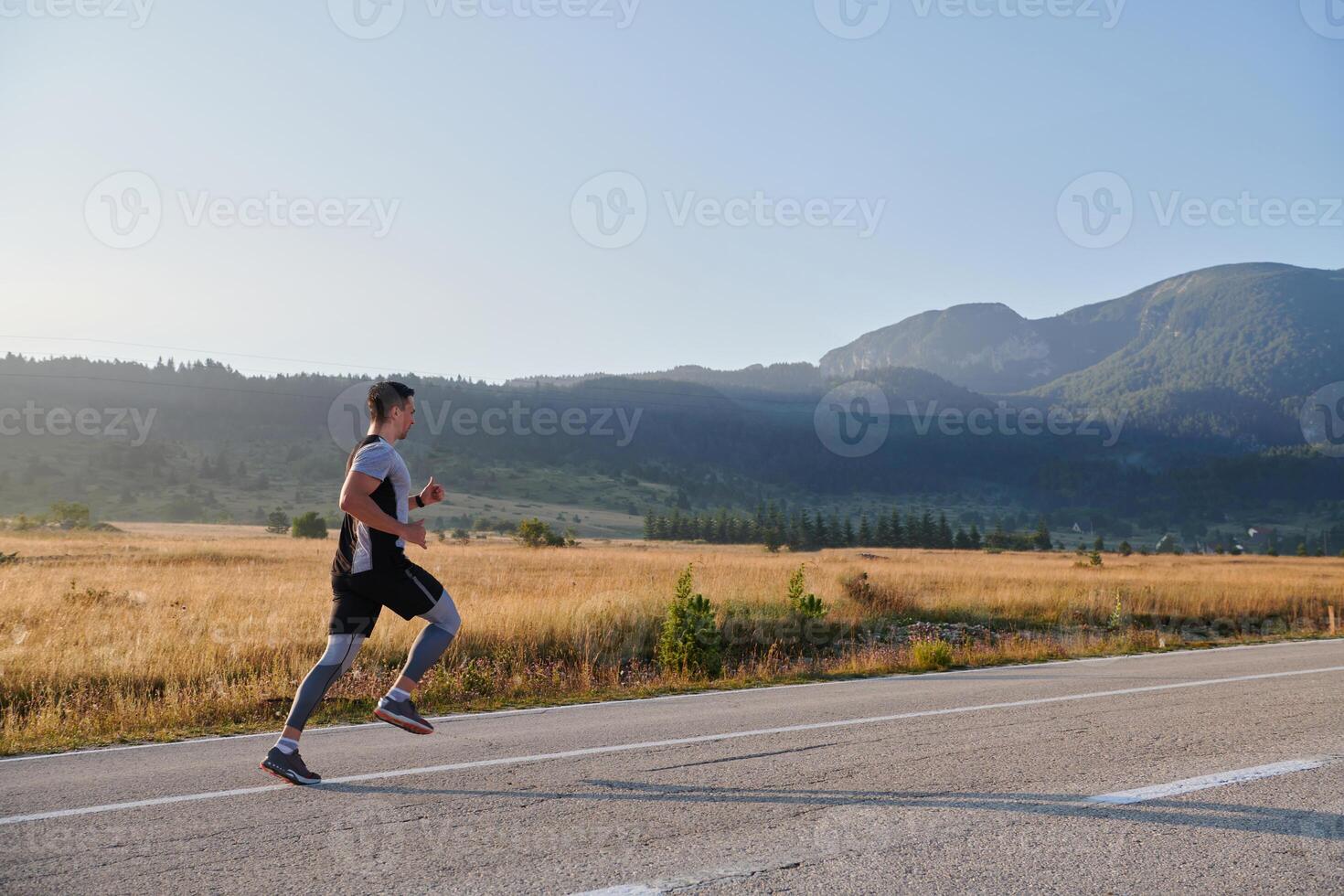 Determined Stride. Athletic Man Embarks on Marathon Preparation with Resolve. photo