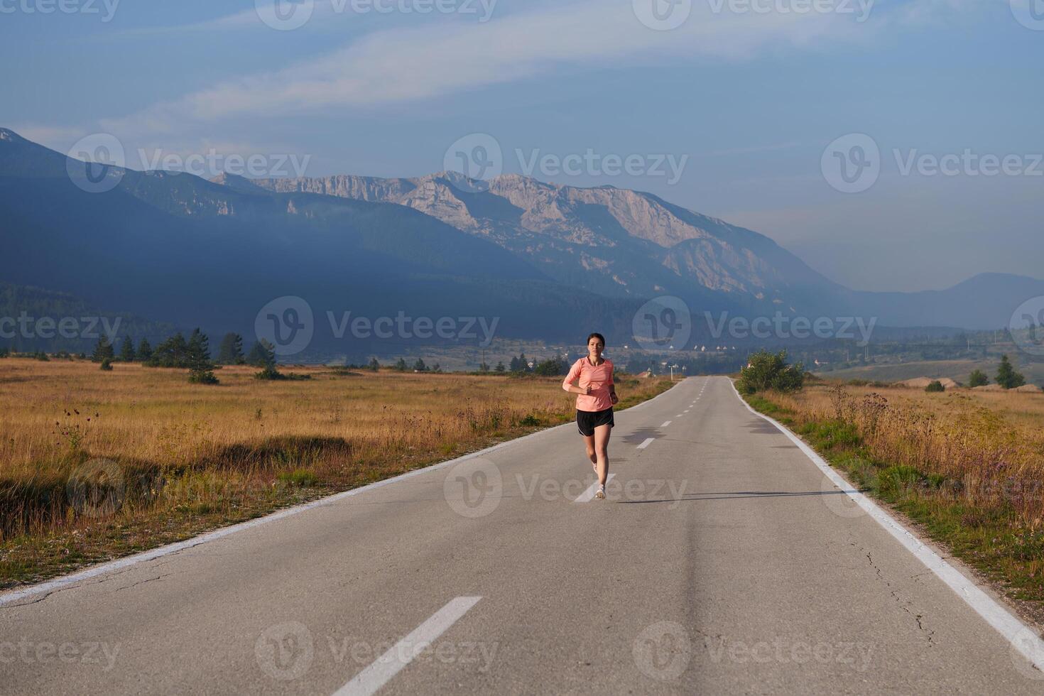 Determined Dawn. Confident and Motivated Athlete Embarks on Sunrise Run. photo