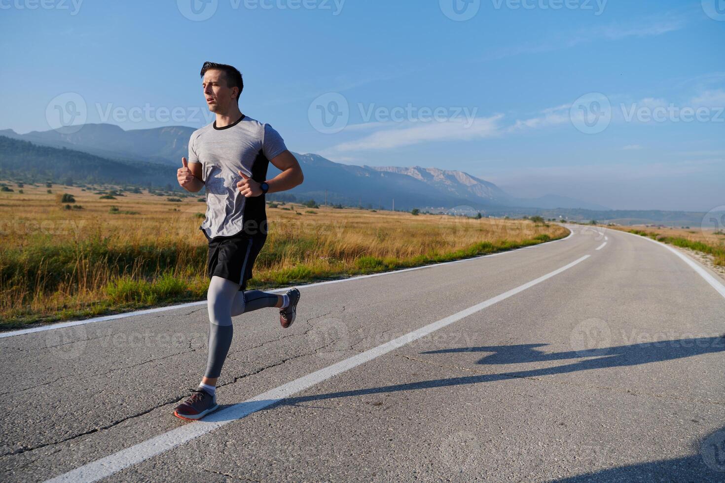 Determined Stride. Athletic Man Embarks on Marathon Preparation with Resolve. photo