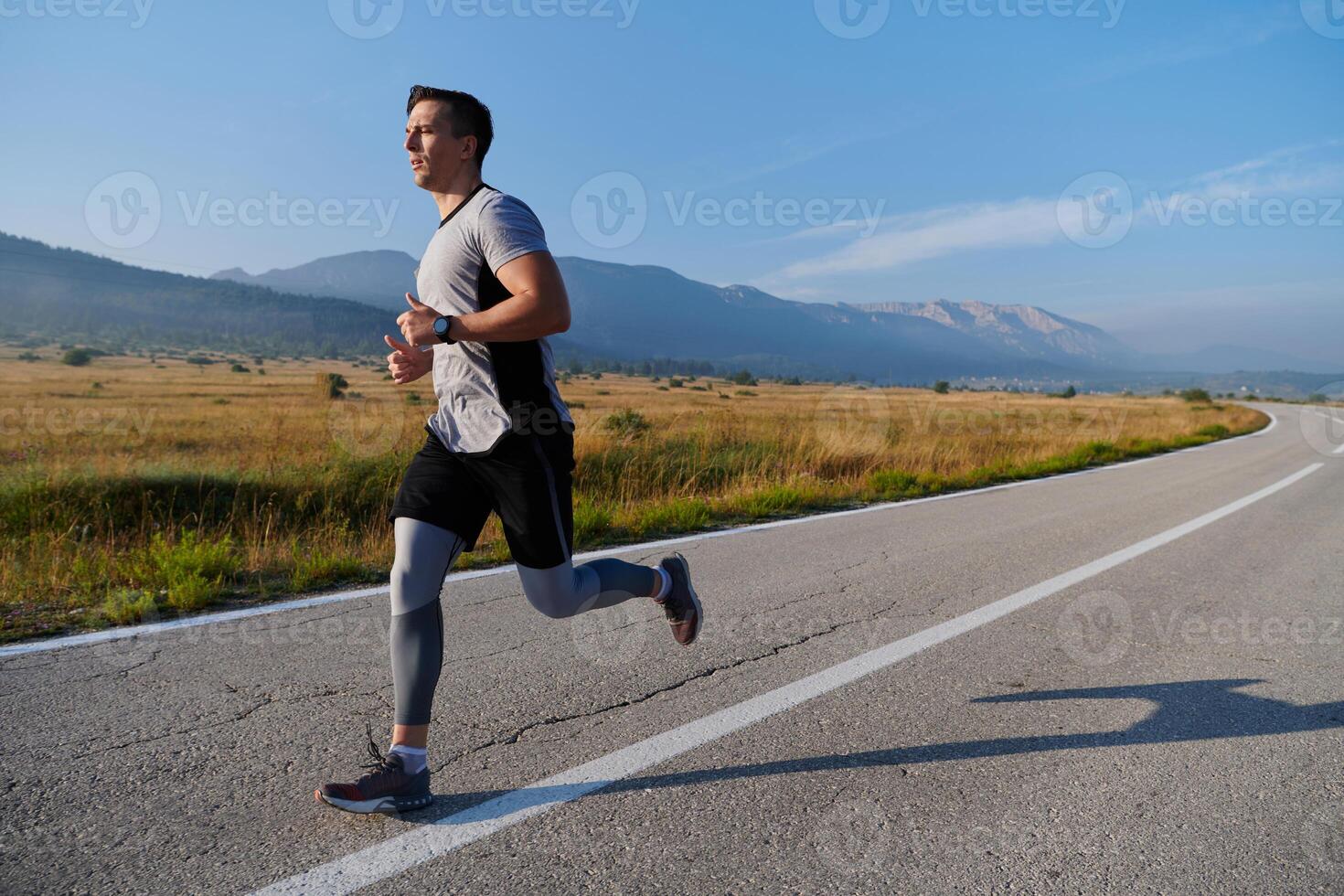 Determined Stride. Athletic Man Embarks on Marathon Preparation with Resolve. photo