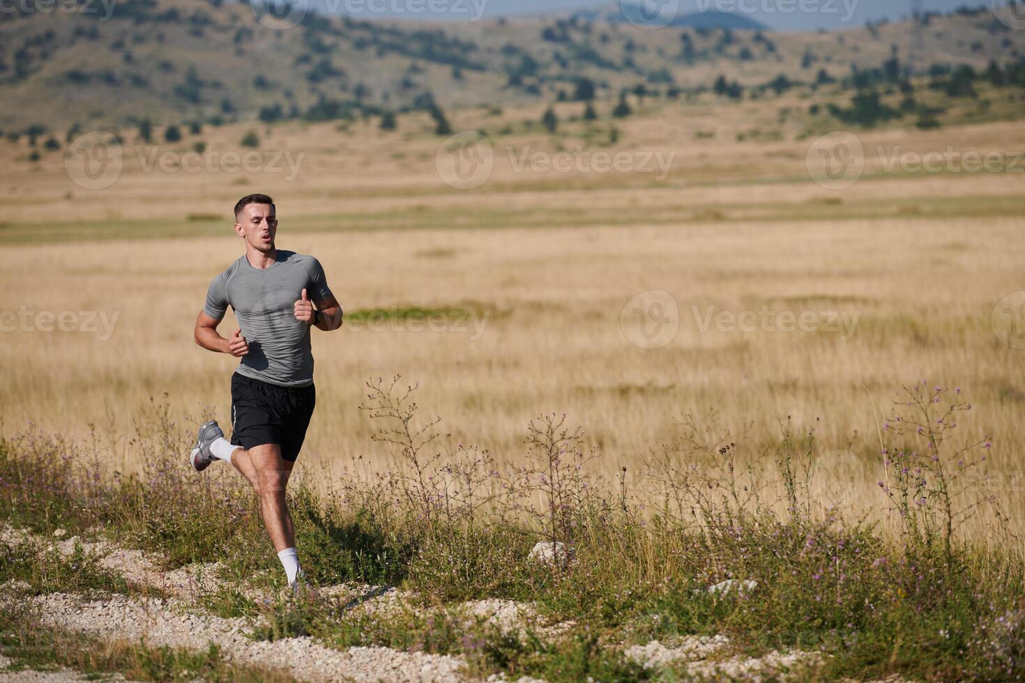 Determined Stride. Athletic Man Embarks on Marathon Preparation with Resolve. photo