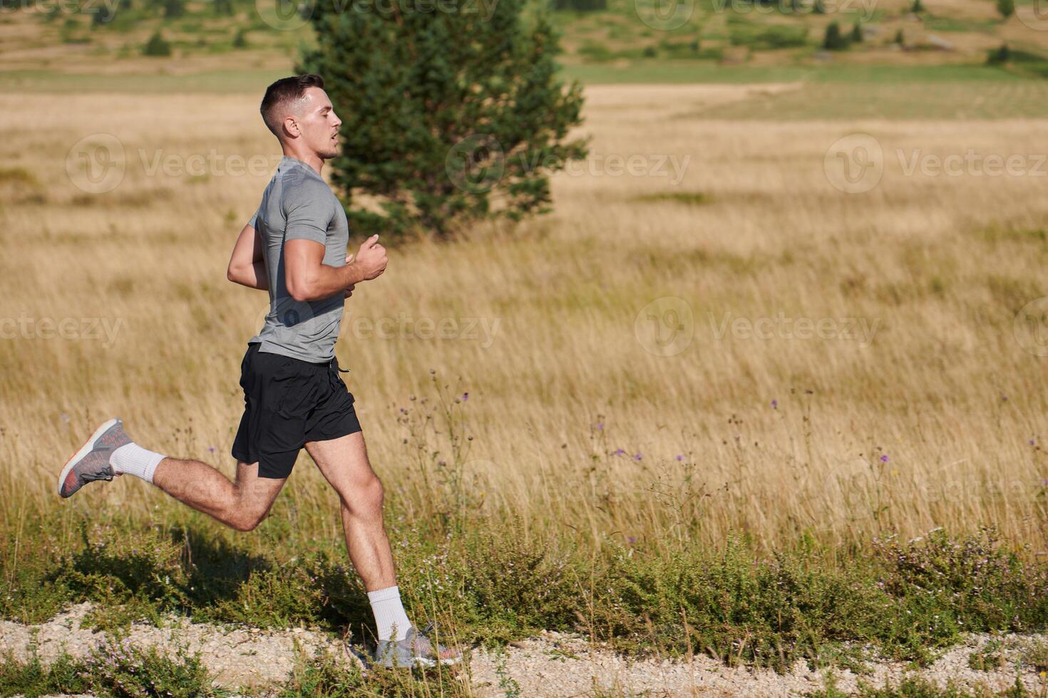 Determined Stride. Athletic Man Embarks on Marathon Preparation with Resolve. photo