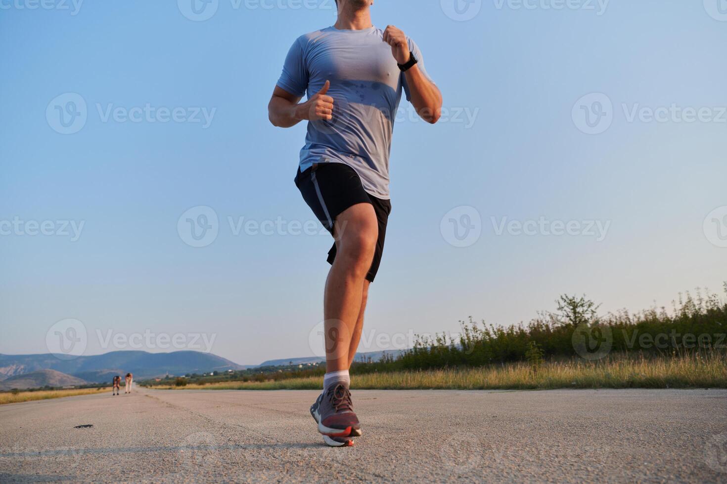 A dedicated marathon runner pushes himself to the limit in training. photo