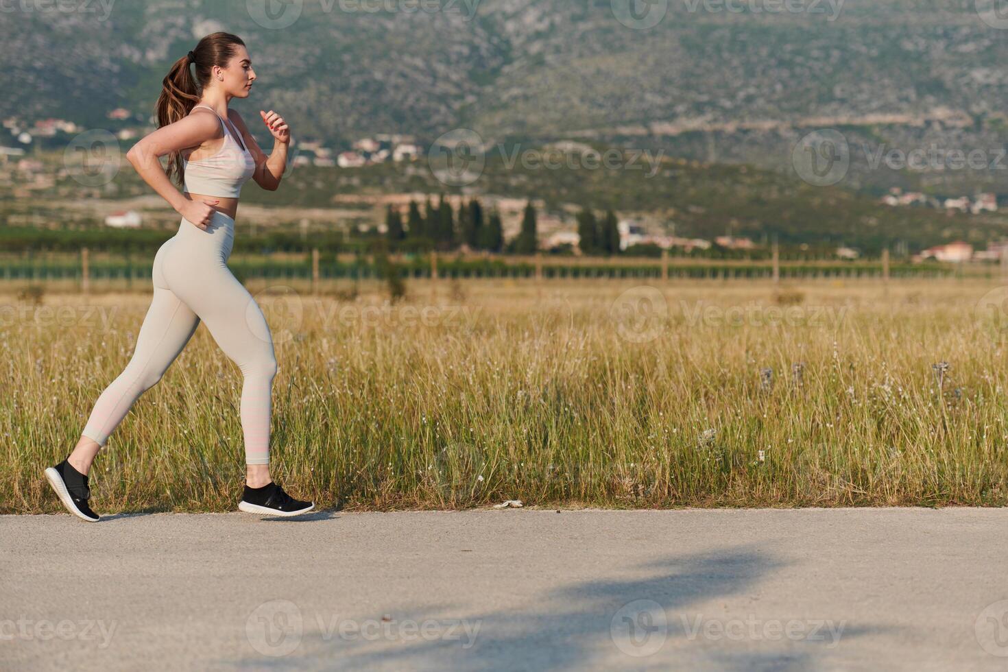 Solo Stride. Determined Athlete Woman Embarks on Fitness Journey for Marathon Preparation. photo
