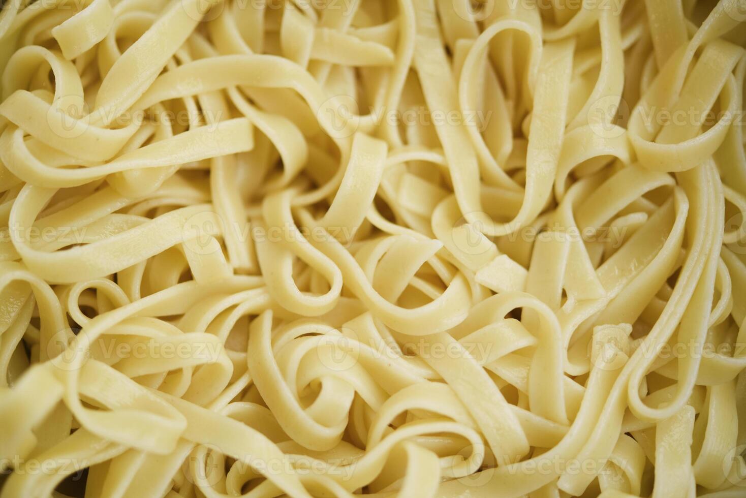 Boiled noodles in close-up. Cooking noodles. photo