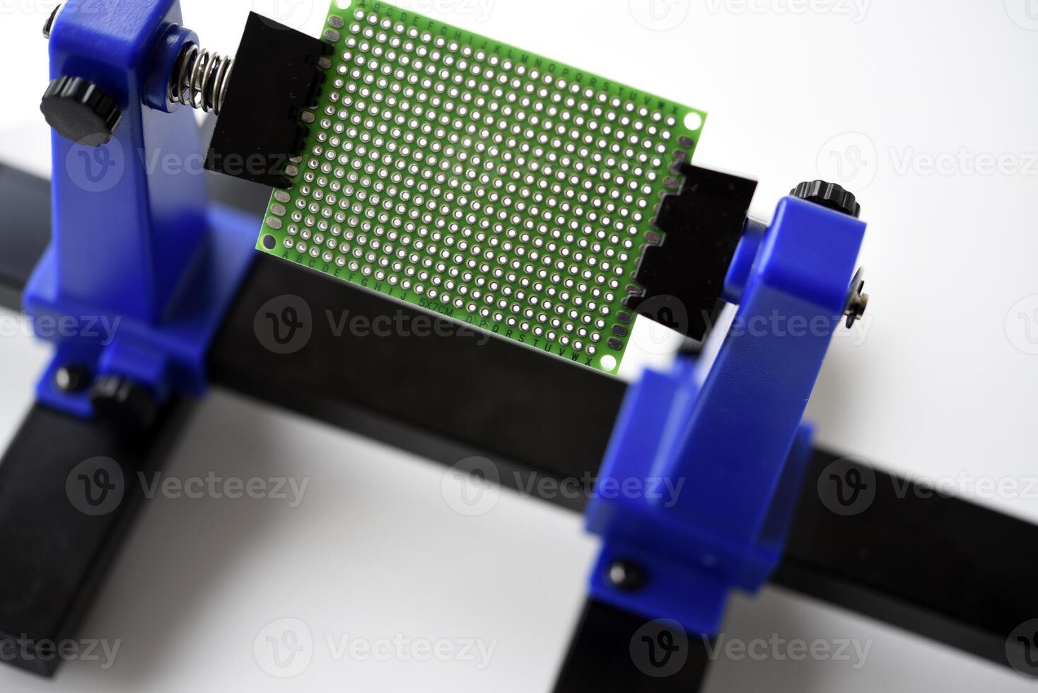 A printed circuit board for trace elements. Radio electronics. A holder for printed circuit boards. photo