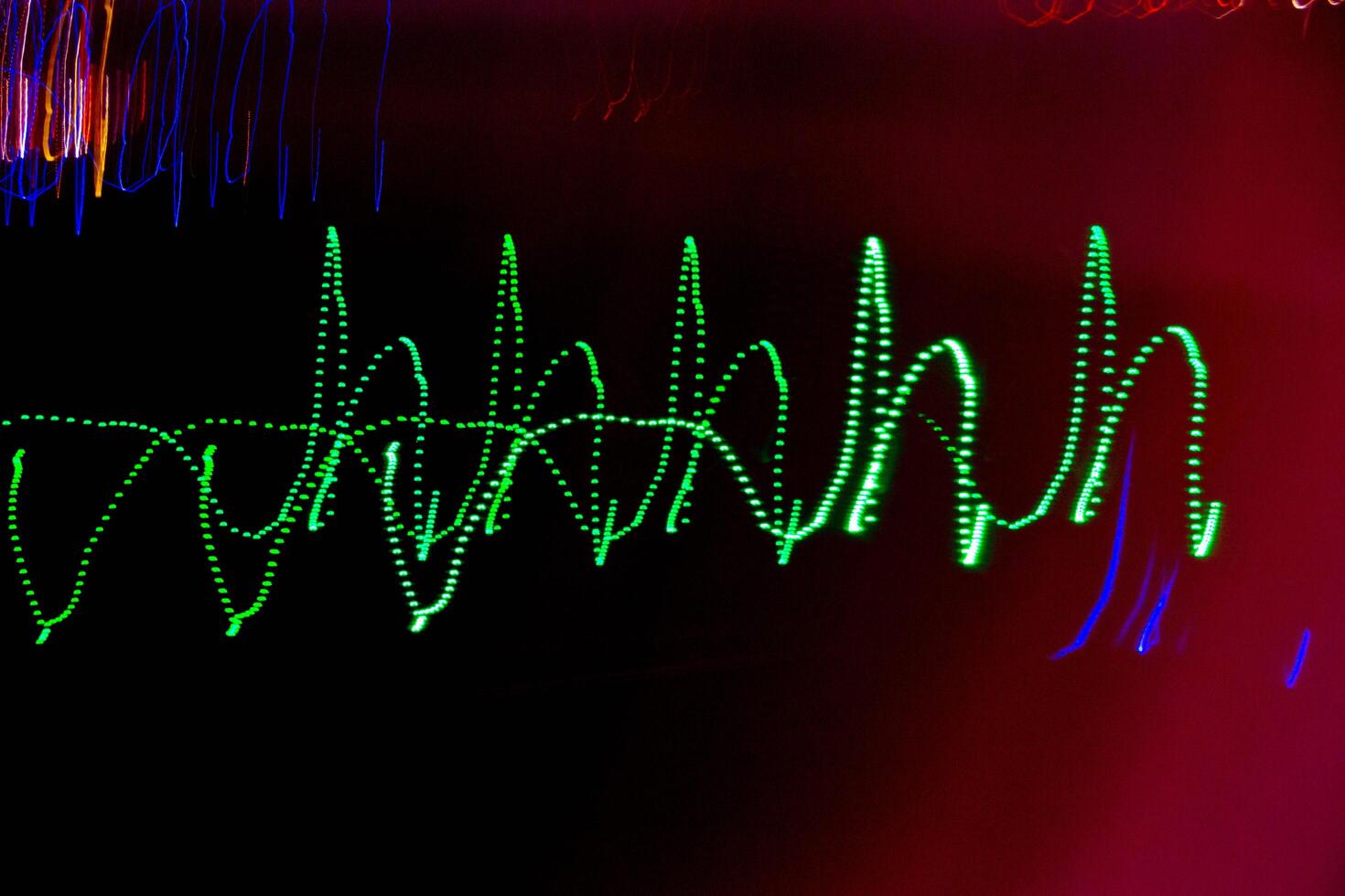 Abstract blurry background with pattern from colorful traces photo