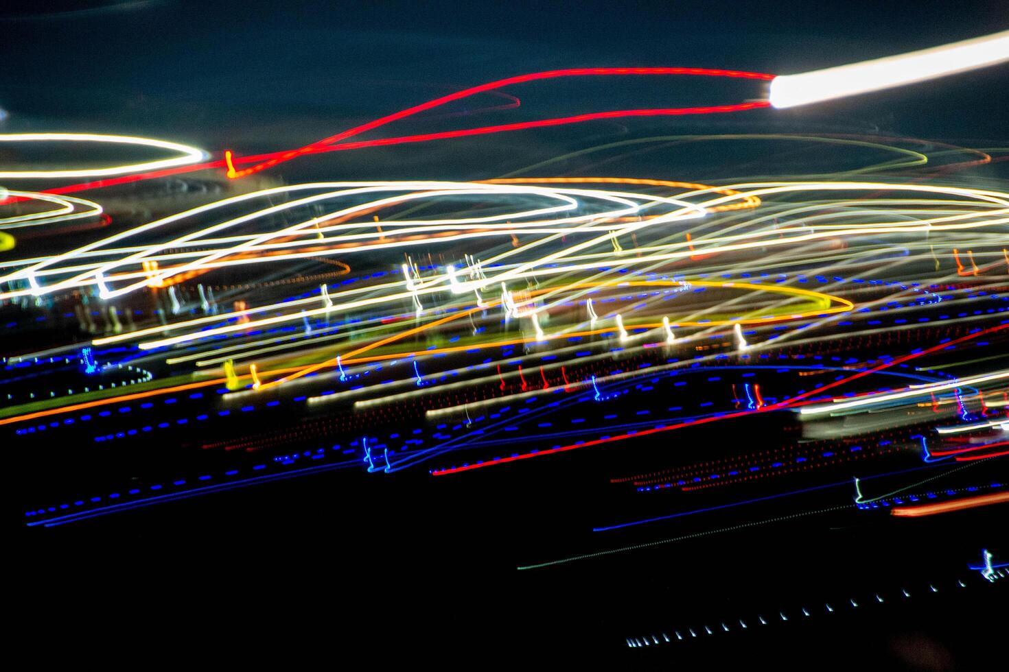 Abstract blurry background with pattern from colorful traces photo
