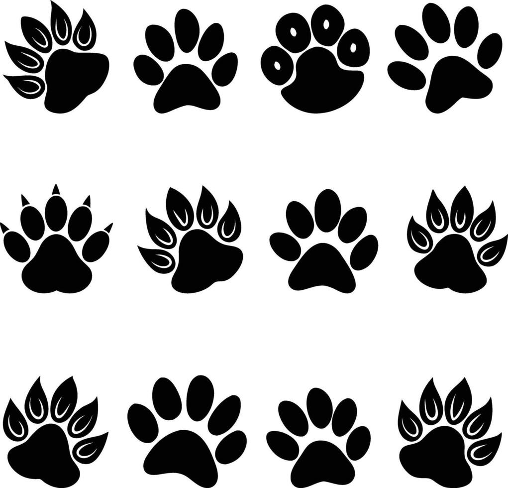set of black silhouettes of different animal paw vector