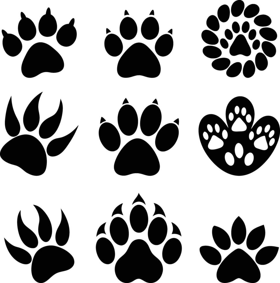 set of black silhouettes of different animal paw vector