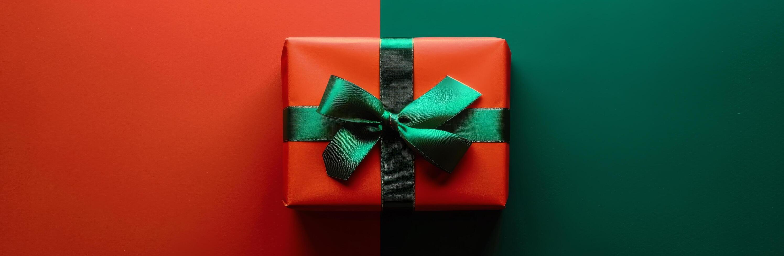 Red Gift Box With Green Bow on Green and Red Background photo