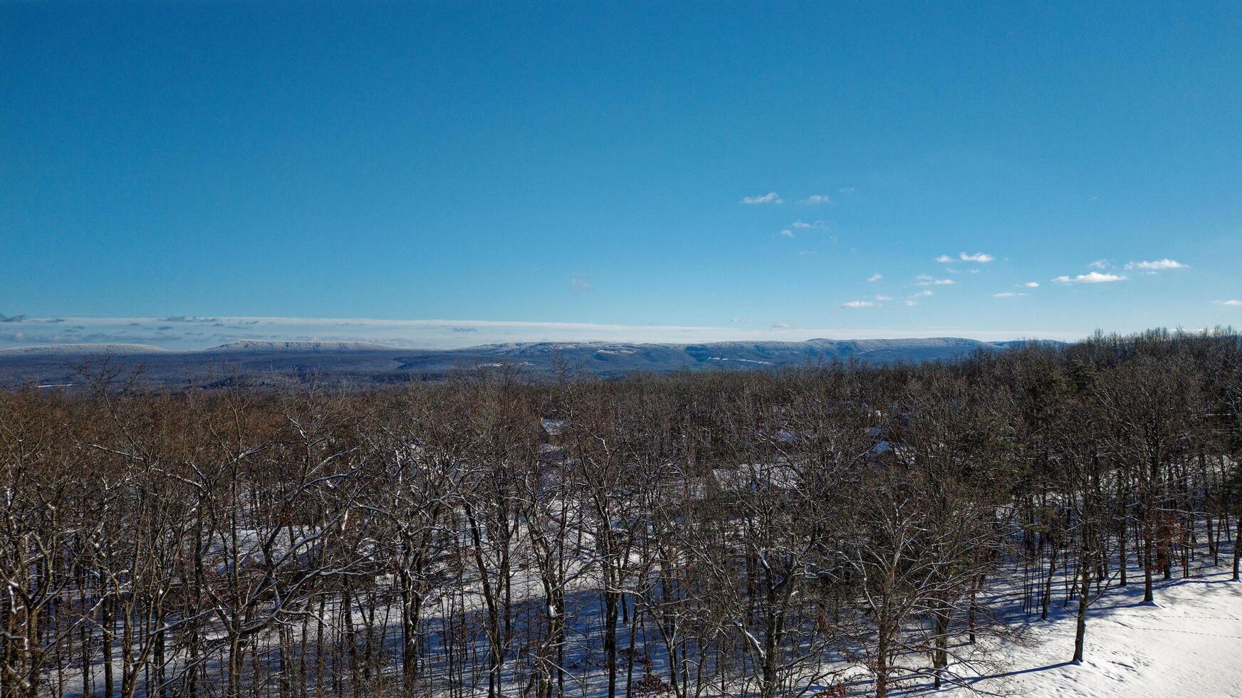 Snow covered mountains in the distance photo