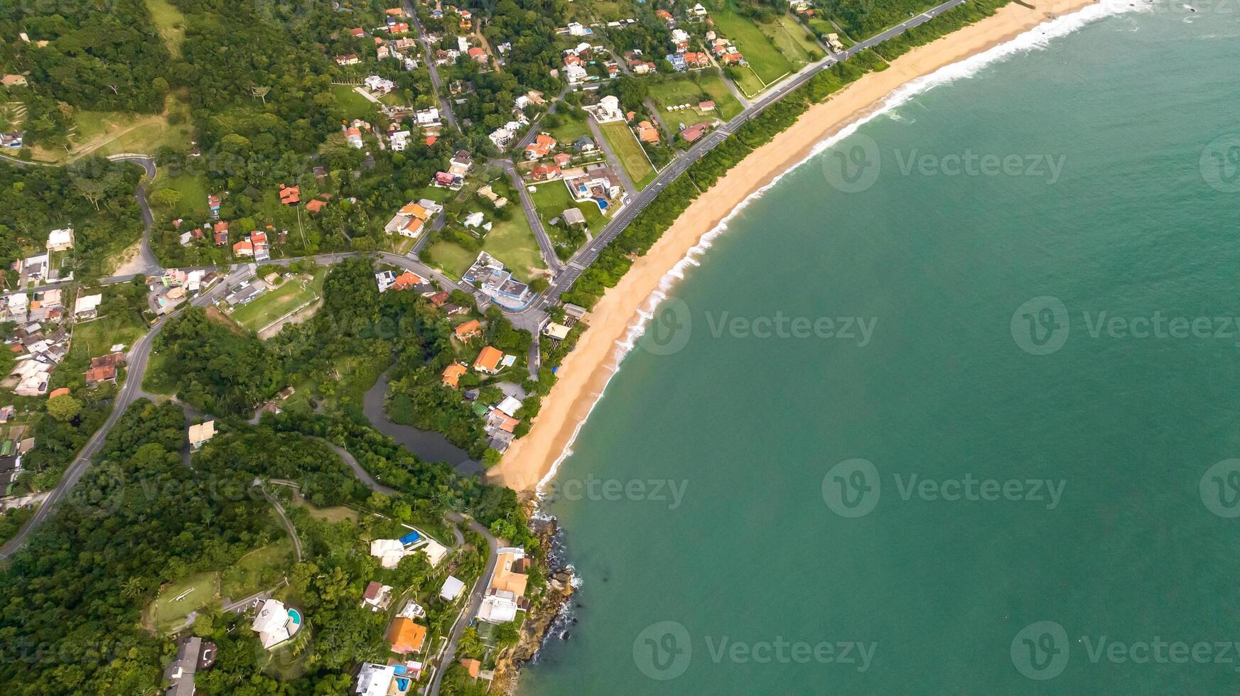 Balneario Camboriu in Santa Catarina. Taquaras Beach and Laranjeiras Beach in Balneario Camboriu. Aerial view in landscape. photo